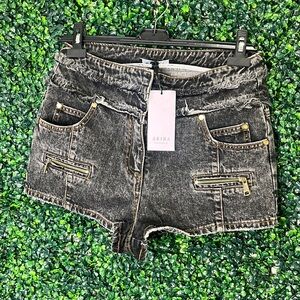 GREY distressed denim jean shorts.